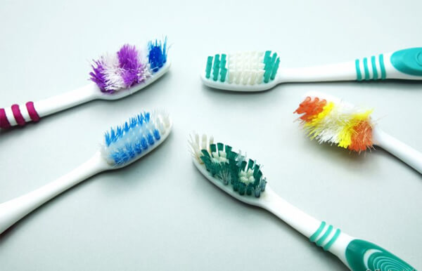 tipos de cerdas escovas de dentes